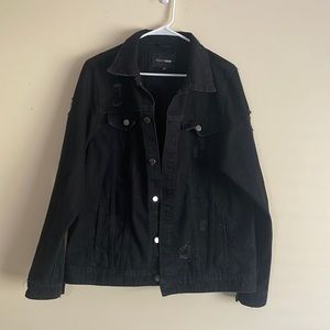 Distressed black denim jacket with lion detail